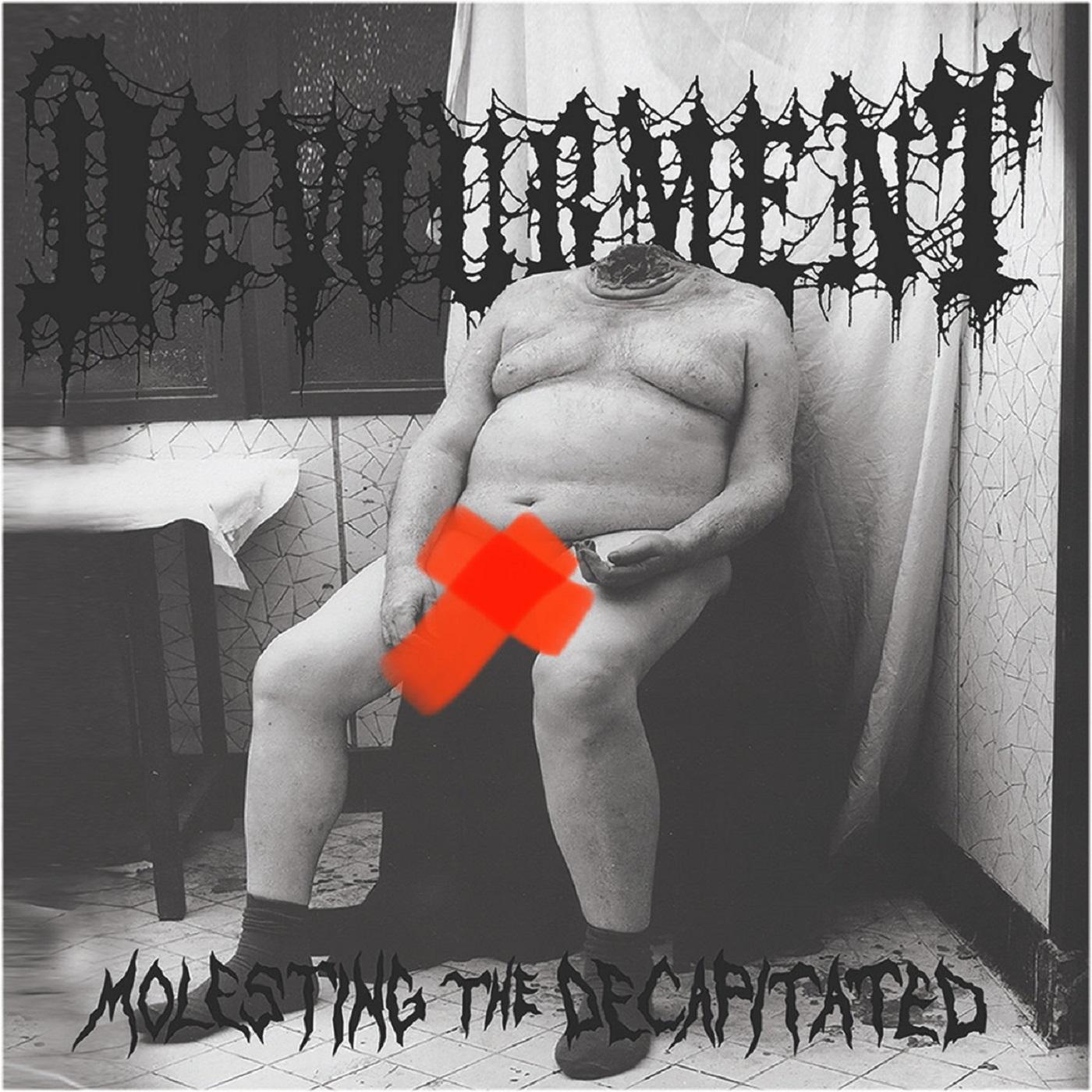 Devourment - Molesting the Decapitated (Red Cassette) Devourment - Molesting the Decapitated (Red Cassette)